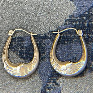10k JCM Diamond cut dangle earrings